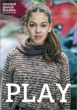 Young person with long hair in a striped sweater looks confidently at the camera. Background is blurred. Text reads "vincent dance theatre" and "PLAY."